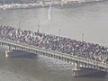 ThousandsofEgyptianprotestersforcepolicetoretreatoverbridge