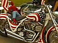 RoyaltyFreeStockVideoSDFootageZoomOutFromaCustomMotorcycleattheFunintheSunToyRuninFtLauderdaleFloridain2002