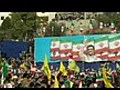 ThousandsgreetarrivalofIranianpresidentinsouthLebanon