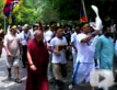 Tibetanprotestersmarchwithfreedomtorch