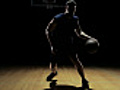 BasketballPlayerDribblesPassedCamera