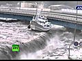 YouTubeNewdramaticvideoTsunamiwavespillsoverseawallsmashesboatscarsflv