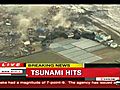 CaughtonTapeTsunamiSweepsOverJapan
