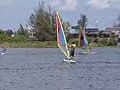 RoyaltyFreeStockVideoSDFootageStudentsLearningtoWindSurfonaLakeinFtLauderdaleFlorida